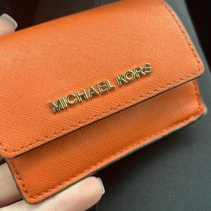 Super cute orange Michael Kors wallet